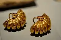Pair of Sumerian earrings with cuneiform inscriptions; 2093–2046 BC; Sulaymaniyah Museum (Sulaymaniyah, Iraq)