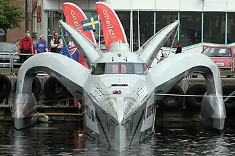 Speedboat Earthrace at a dock in Malmö, Sweden.