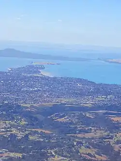 An aerial view of some of the suburbs traditionally considered East Auckland, including Bucklands Beach, Howick and Botany Downs.