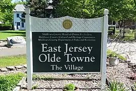 Village entrance sign in 2014