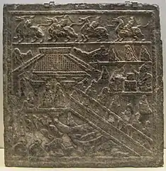 Stone carving from the Eastern Han dynasty, with depiction of a waterside pavilion overlooking a lake full of fish, turtles, and waterfowl