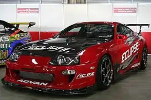 Fourth-generation Toyota Supra A80 modified with body kit, wheels, and engine modifications.