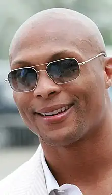 A picture of Eddie George wearing sunglasses.