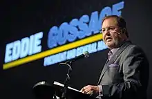 Eddie Gossage speaking in a motivational address in 2019