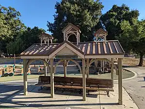 Railroad station-themed shelter at Edenvale Garden Park