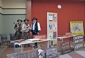 Frontier Village enthusiasts and collected memorabilia, primarily ride signs, displayed at the Edenvale Branch of the San Jose Public Library.