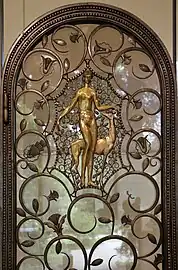 The foliage scroll - Elevator doors, by Edgar Brandt, 1926, wrought iron, glass, patinated and gilded bronze, Calouste Gulbenkian Museum, Lisboa, Portugal