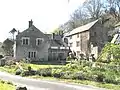 Edge Barton, viewed from east. The top of the circular staircase tower is visible in the corner of the north and west wings (right)