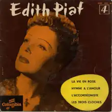 Edith Piaf looking to the right, the image in a sepia hue.