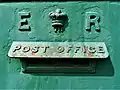Edward VII post box in Ireland, painted green.