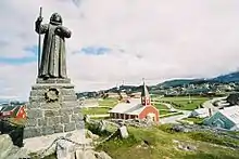 Statue of Hans Egede in the foreground with Nuuk Cathedral in the background