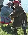 Two elder ladies dancing