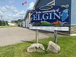 Elgin's welcome sign located in the main, or "Four Corners" area