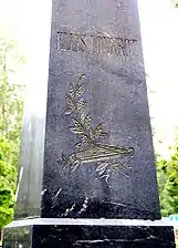 Cenotaph at his grave, with a kantele on it