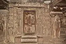 Jain Tirthankara Mahavira with Yaksha Matanga and Yakshi Siddhaiki at Ellora Caves.