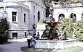 Fountain outside mansion