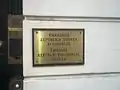 Plaque outside the embassy in English and Spanish