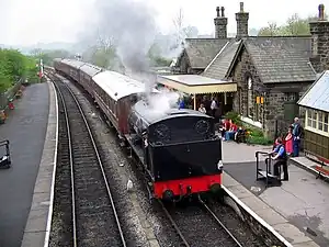 A historical train pulling in from Bow Bridge sidings