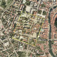 True to scale 1st century AD Emona vith insulase, wall, gates and towers. Note high level of modern streets and walls still overlapping