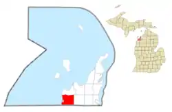 Location within Leelanau County (red) and the administered village of Empire (pink)