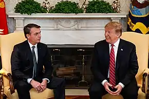 Image 183Brazilian President Jair Bolsonaro and United States President Donald Trump in 2019. Both leaders are emblematic of a wave of neo-nationalist and globalisation-weary conservative populism in the second half of the decade. (from 2010s)