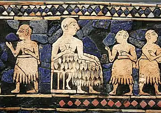 Enthroned Sumerian king of Ur, with attendants. Standard of Ur, c. 2600 BCE.