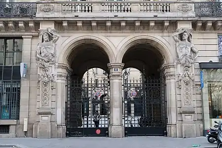 Beaux Arts atlantes at a monumental entrance on Rue du Louvre no. 15, Paris, unknown architect and sculptor, c. 1900