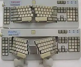 KeyTronic FlexPro and OEM ergoLogic (1993) adjustable split keyboards, showing the ability to modify opening and tenting angles