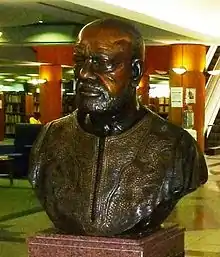 His bust in the Es'kia MphahleleCommunity Library, Pretoria
