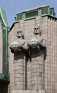 Statues at Helsinki Central railway station by Emil Wikström