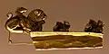 Etruria, goldsmiths from the Archaic period, 6th century BC, stirrup fibula with leonine protomes 02