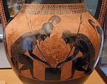 Achilles and Ajax playing a board game. Eight-pointed sun symbols are depicted on their cloaks. Amphora by Exekias, 6th century BC, Vatican Museum.