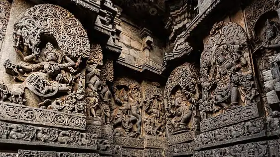 Exterior wall reliefs at Hoysaleswara Temple. The temple was twice sacked and plundered by the Delhi Sultanate in the early 14th century, and abandoned in the mid 14th century.