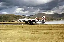 49th FBW Republic F-84E-25-RE Thunderjets taking off in Korea. Serial 51–221 in foreground.