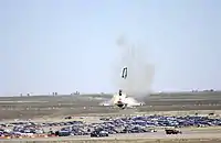 Image 4At the Mountain Home Air Force Base in Elmore County, Southwestern Idaho in September 2003 Capt. Christopher Stricklin ejected from the USAF Thunderbirds number six aircraft less than a second before it impacted the ground at an air show at the base. Stricklin, who was not injured, ejected after guiding the jet away from the crowd of more than 60,000 people