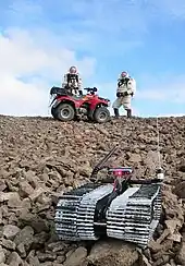 The DARPA – US Army telerobot "Solon" and Crew 3 explore Devo Rock canyon on July 26, 2001.