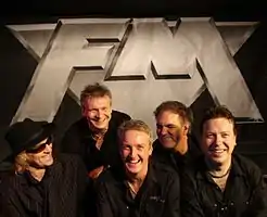 UK band FM at the video shoot for Wildside - Crewe, 26 July 2009.  From left to right: Merv Goldsworthy, Jem Davis, Steve Overland, Pete Jupp, Jim Kirkpatrick