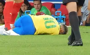 Neymar lying on the ground during the 2018 FIFA World Cup in Russia
