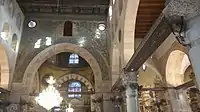 Decorated wall above mihrab near central dome facing main entrance