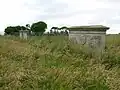 The cemetery garden railings and walls frontage.