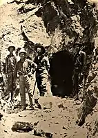 Prospectors examining mine near Fairview, c 1906