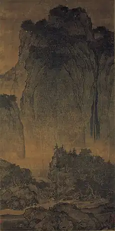 Fan Kuan (范寬; Fàn Kuān; Fan K'uan, c. 960–1030), Travellers among Mountains and Streams (谿山行旅圖), ink and slight color on silk, dimensions of 6.75 ft × 2.5 ft (2.06 m × 0.76 m). 11th century, China. National Palace Museum, Taipei