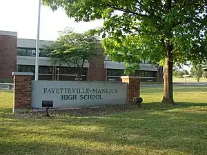 The front of the high school, facing south onto Route 173.