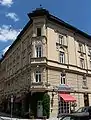 This neo-renaissance corner building, built in 1892, was originally the location of the sculpture of Heine, which was replaced by a year with and upside down "5".