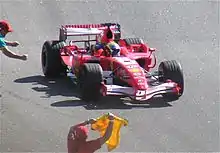 Felipe Massa winning the 2006 Brazilian Grand Prix driving the Ferrari 248 F1 with Marlboro replaced by bar codes and with added sponsors from Martini and Bridgestone