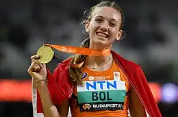 Photo of Femke Bol holding a gold medal from the 2023 World Championships