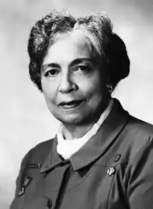 Black-and-white photograph of a middle-aged black woman, wearing a formal jacket.