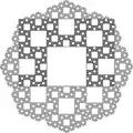 Construction by iterated collection of 8 square patterns around each square pattern.