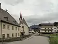 Fieberbrunn, church (Katholische Pfarrkirche) in the street