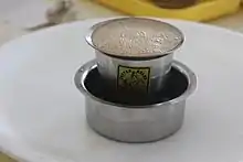 Coffee served in a metal tumbler